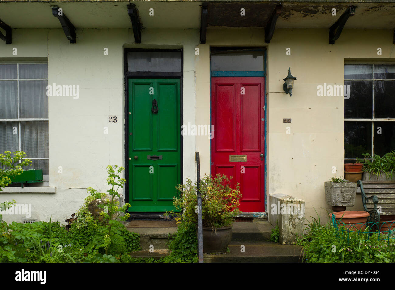Red and green front doors, Hastings, UK Stock Photo