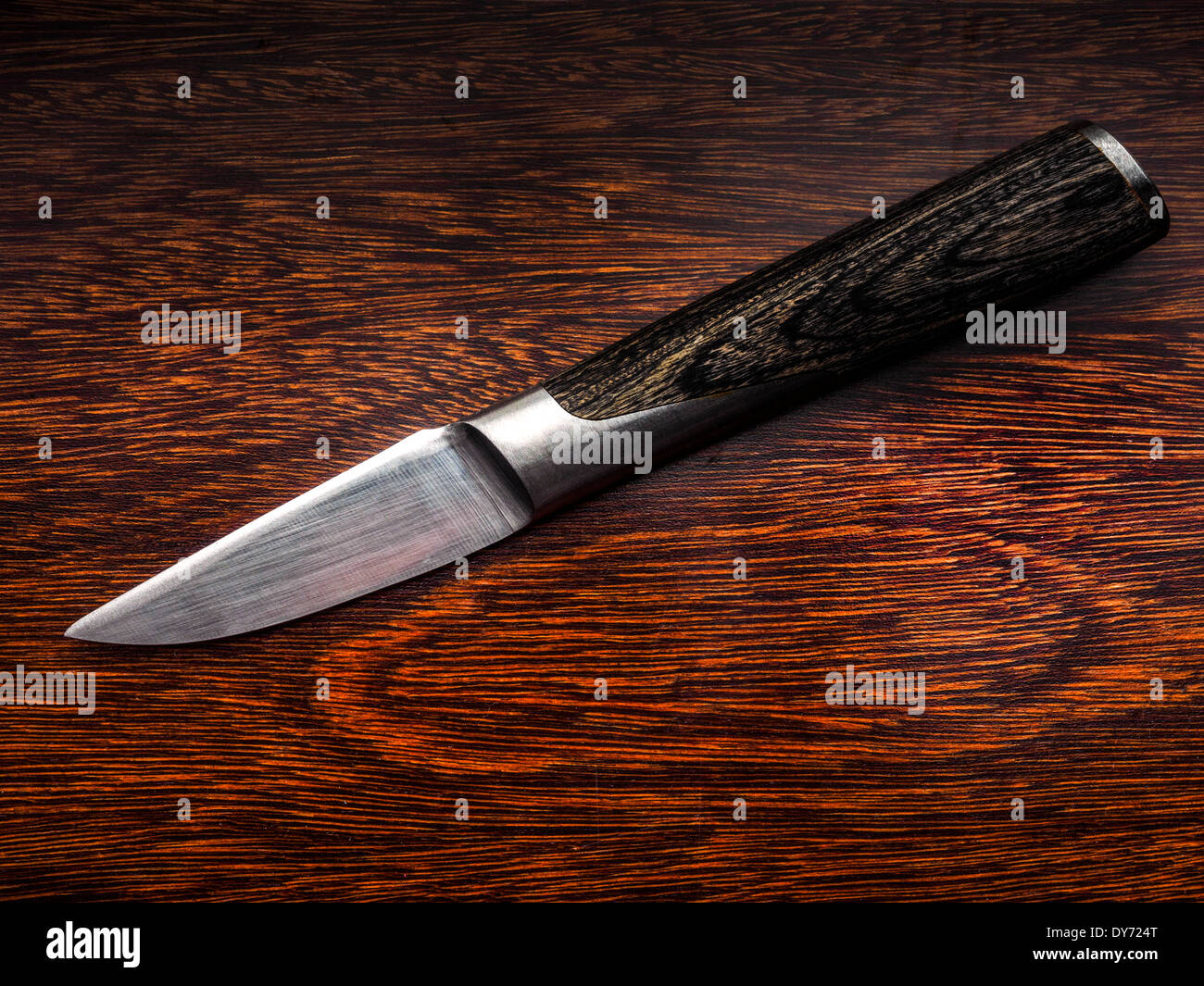 Kitchen paring knife with wooden handle Stock Photo