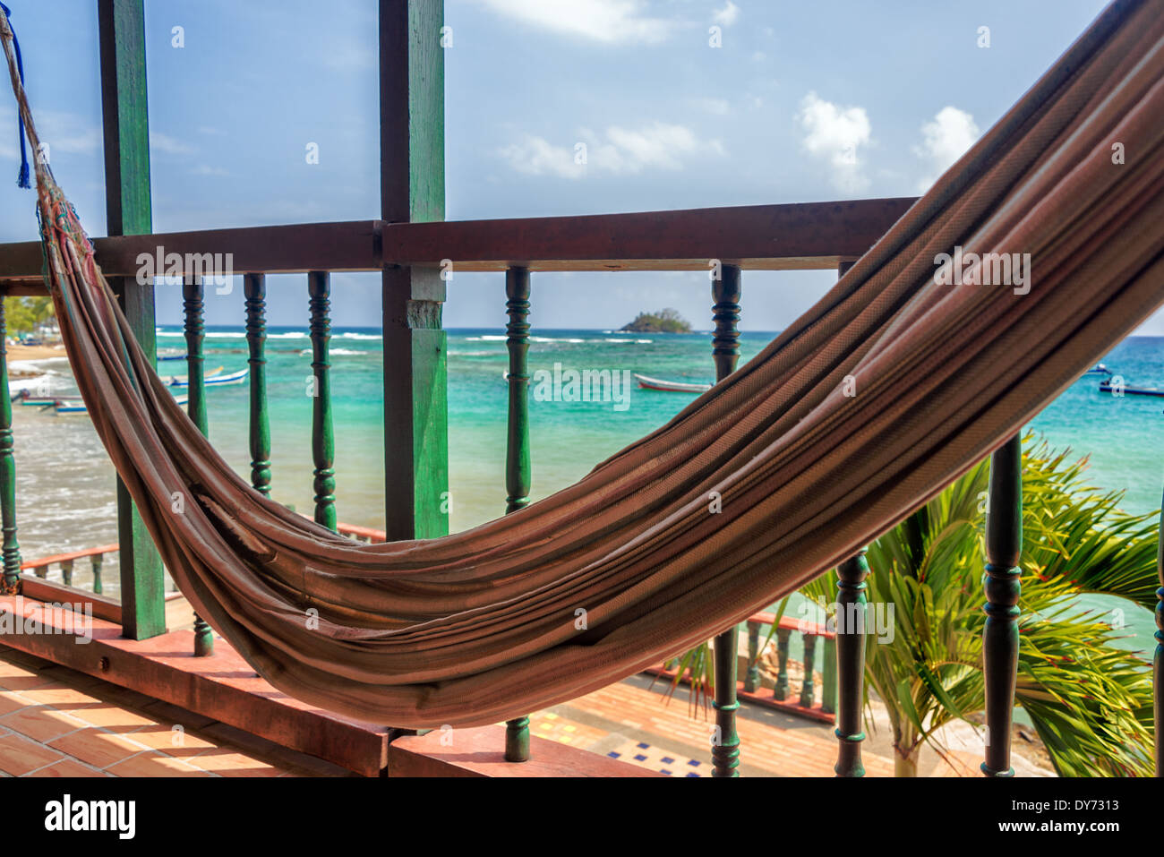 Hammock on a balcony overlooking the Caribbean Sea in Capurgana, Choco