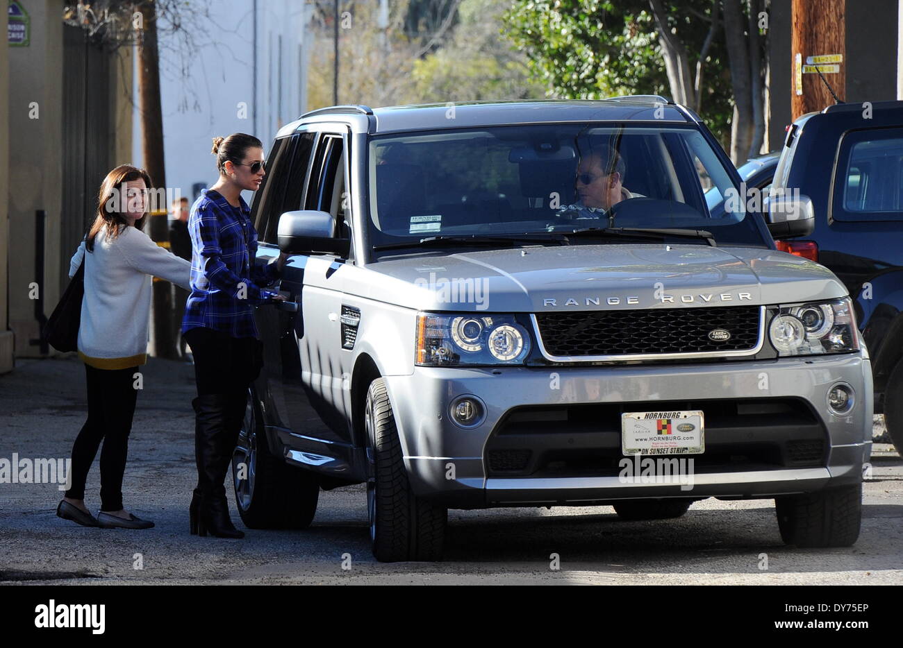 Glee star Lea Michele at a hair salon with her mother in West Hollywood  while her dad chauffeurs them around town in Cory Monteith's car Featuring:  Lea Michele Where: Los Angeles California