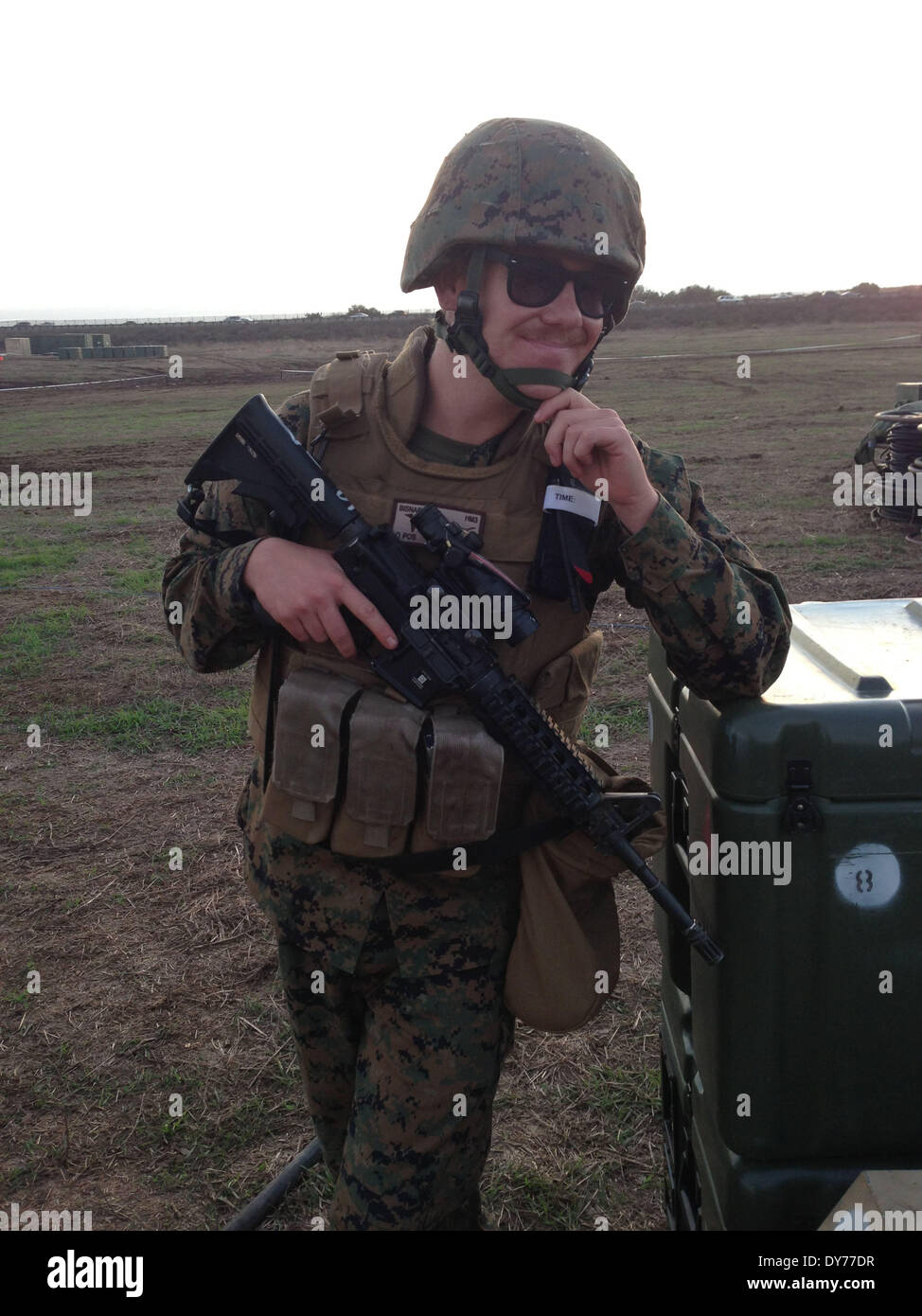 US MARINE RESCUES FOUR ORPHAN RABBITS A U.S. Marine Corps unit worker