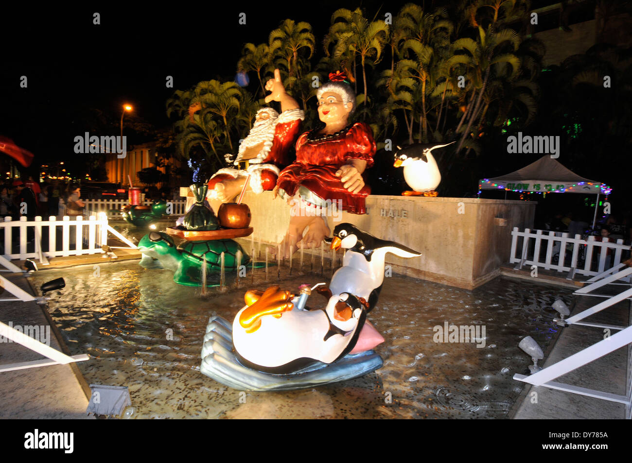 Christmas decoration with traditional Hawaiian characters such as 'Shaka Klaus' and 'Mumu Klaus' in Honolulu, Oahu, Hawaii, USA Stock Photo