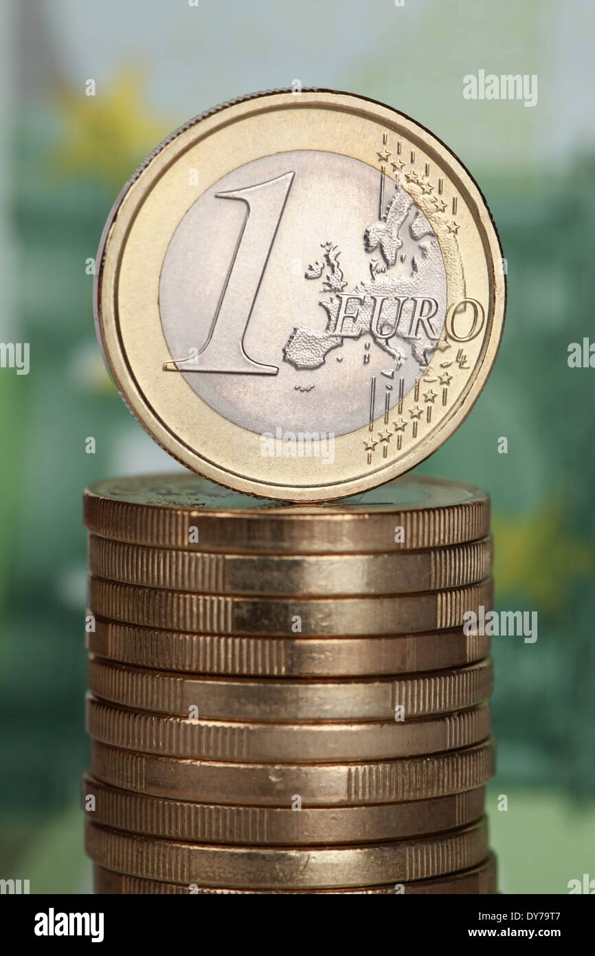 One Euro coin on a stack of Euro coins Stock Photo