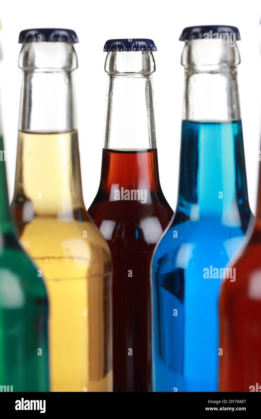 Colorful bottles with soda isolated on a white background Stock Photo