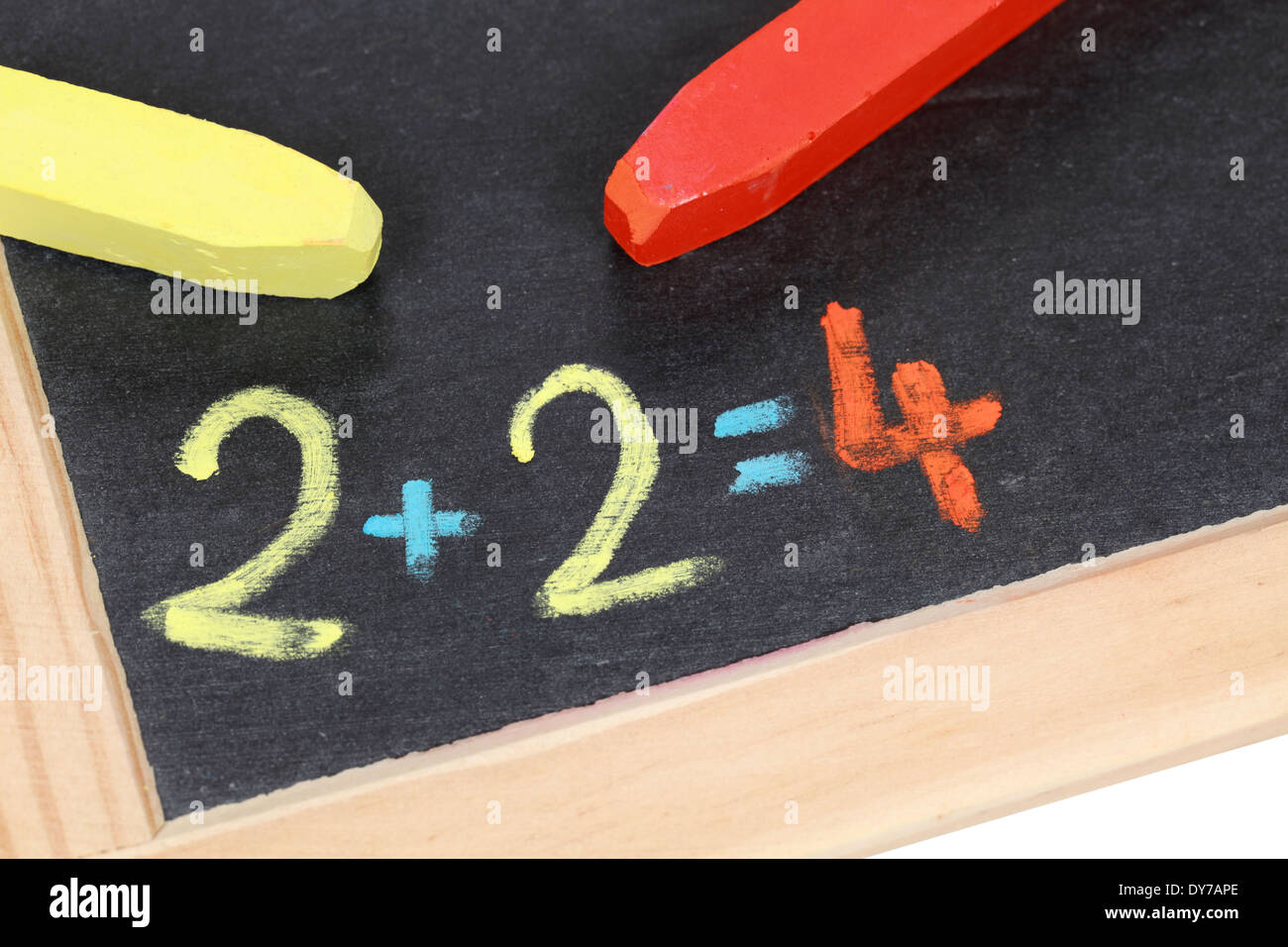 A mathematics calculation on a blackboard at school Stock Photo