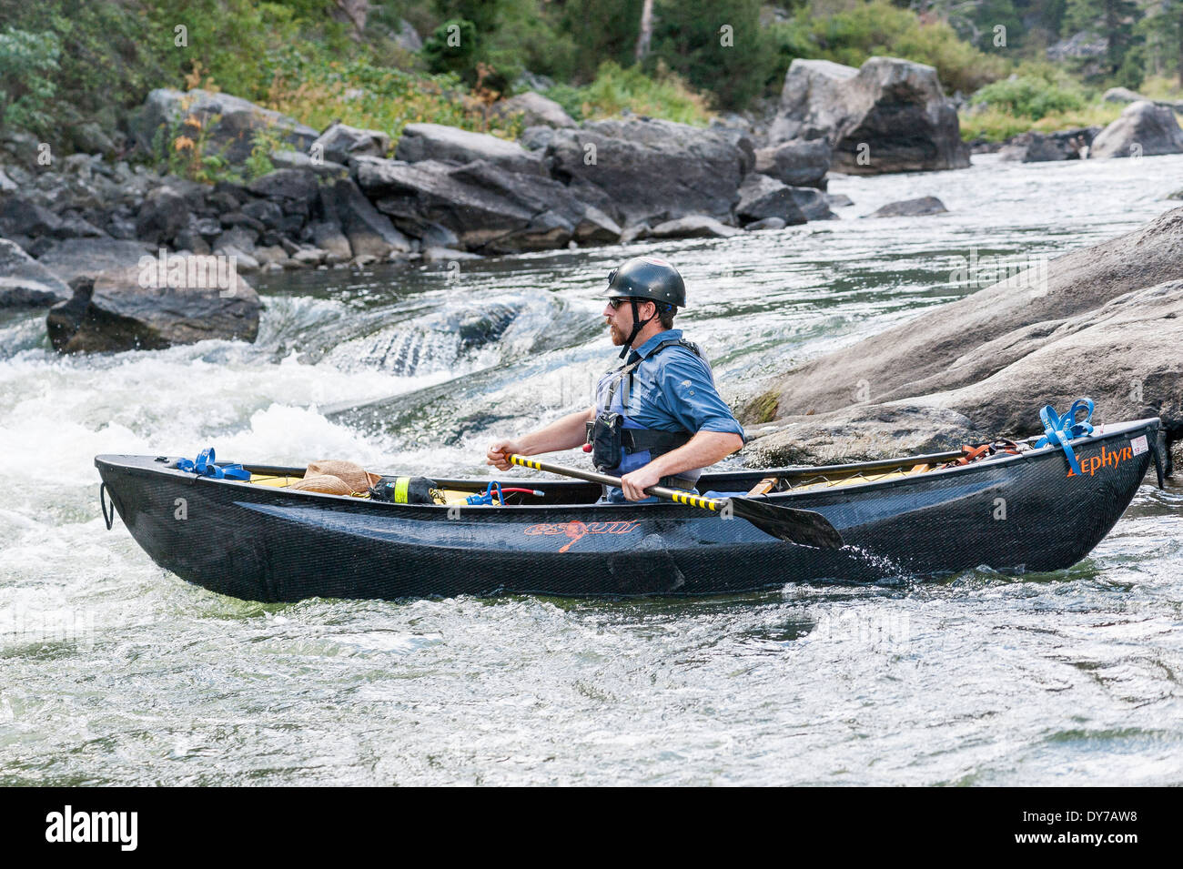 Canoe paddler, Bear Trap Canyon, Madison River, Ennis, Montana Stock