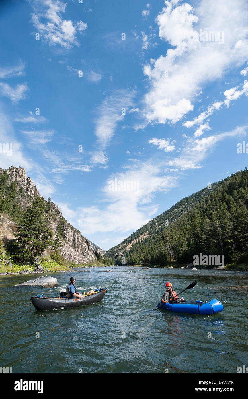 Canoe paddler and pack raft paddler, Bear Trap Canyon, Madison River