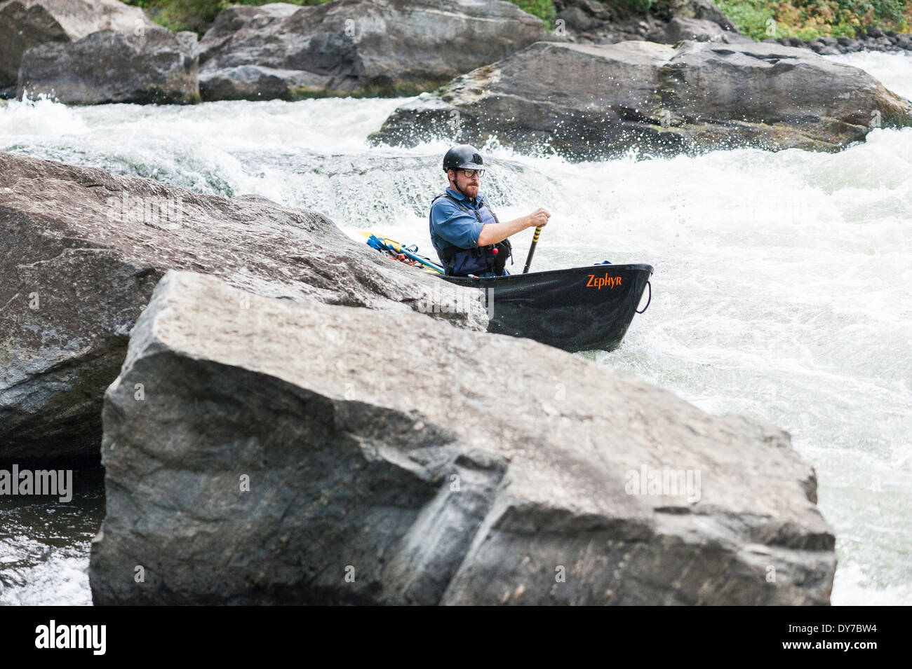 Canoe paddler, Bear Trap Canyon, Madison River, Ennis, Montana Stock