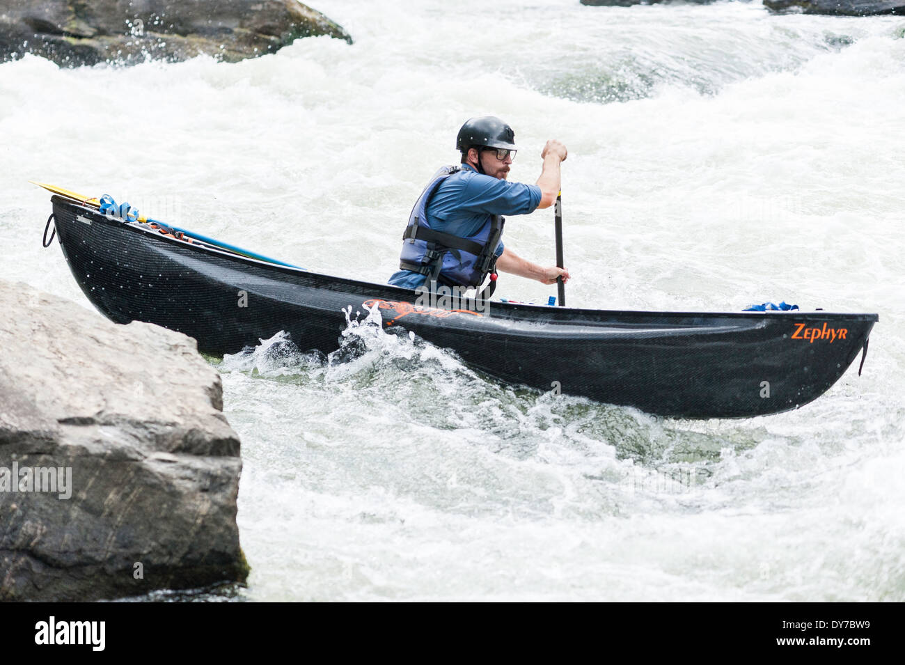 Canoe paddler, Bear Trap Canyon, Madison River, Ennis, Montana Stock