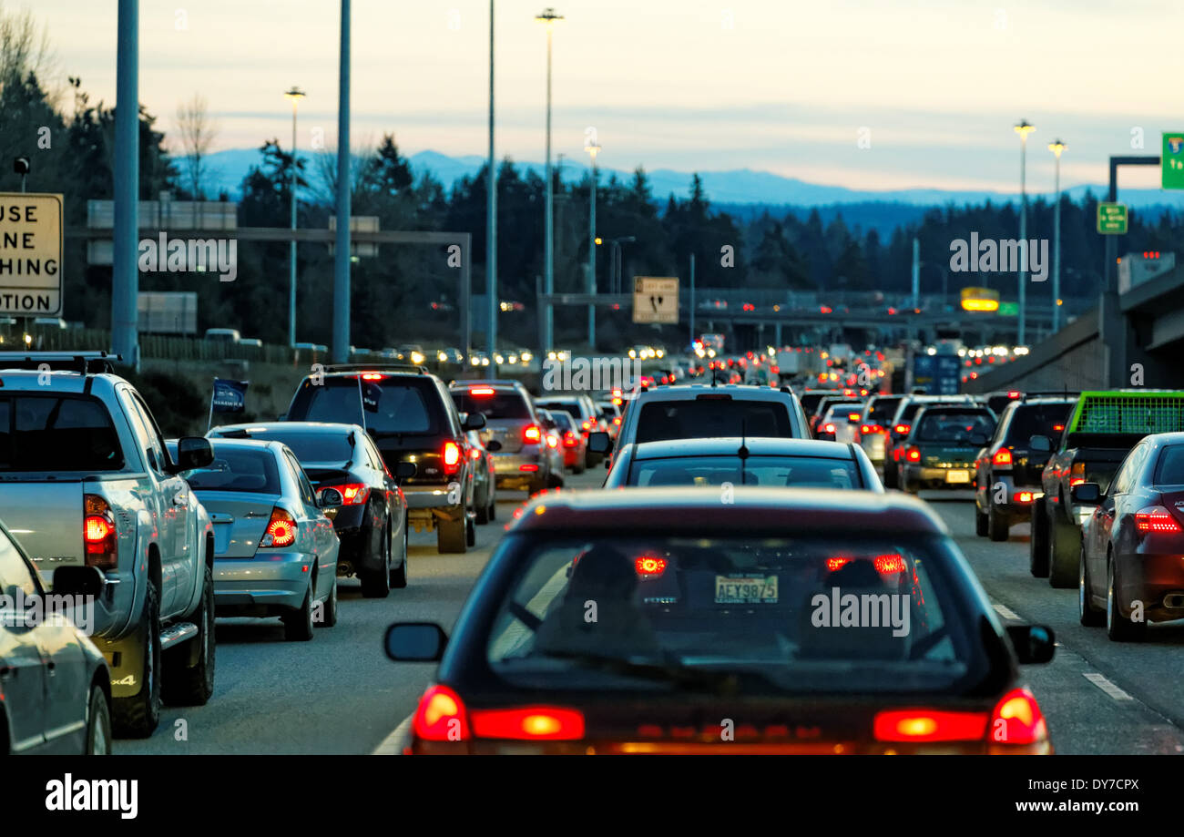41,675.04275a Evening rush hour automobile transportation travel crowded four 4 lane Interstate highway suburban city traffic Stock Photo