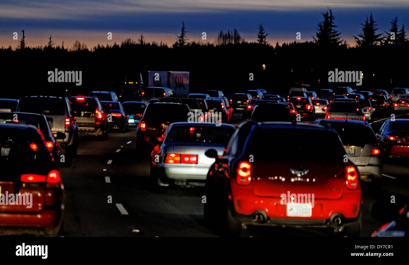 41,675.04293a Nighttime automobile transportation travel after dark crowded rush hour four 4 lane Interstate highway traffic Stock Photo