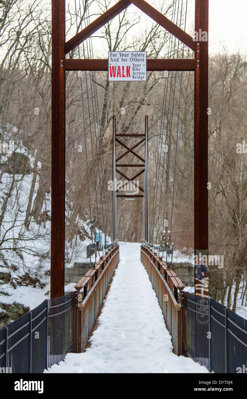 Suspension Bridge In Patapsco State Park Covered In Snow In