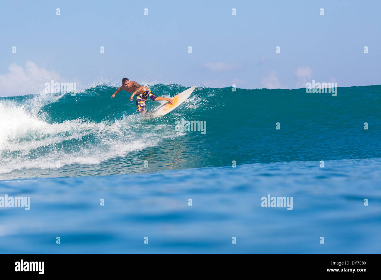 Surfing a wave. GLand surf area.Java island.Indonesia Stock Photo Alamy
