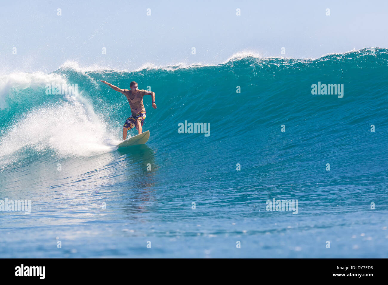 Surfing a wave. GLand surf area.Java island.Indonesia Stock Photo Alamy