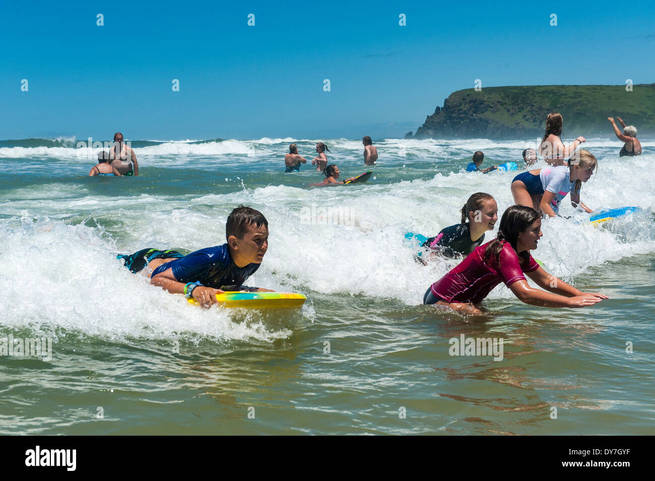 Children having fun surfing with boogie boards, Bay, Eastern