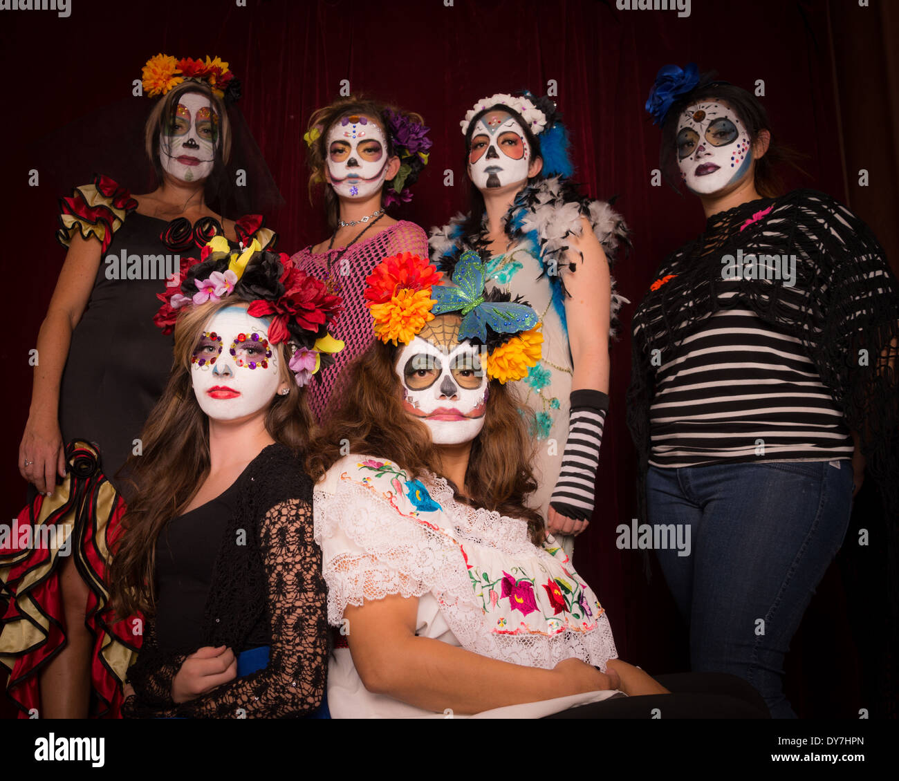 Girls dressed in Day of The Dead costumes and make posing Stock Photo