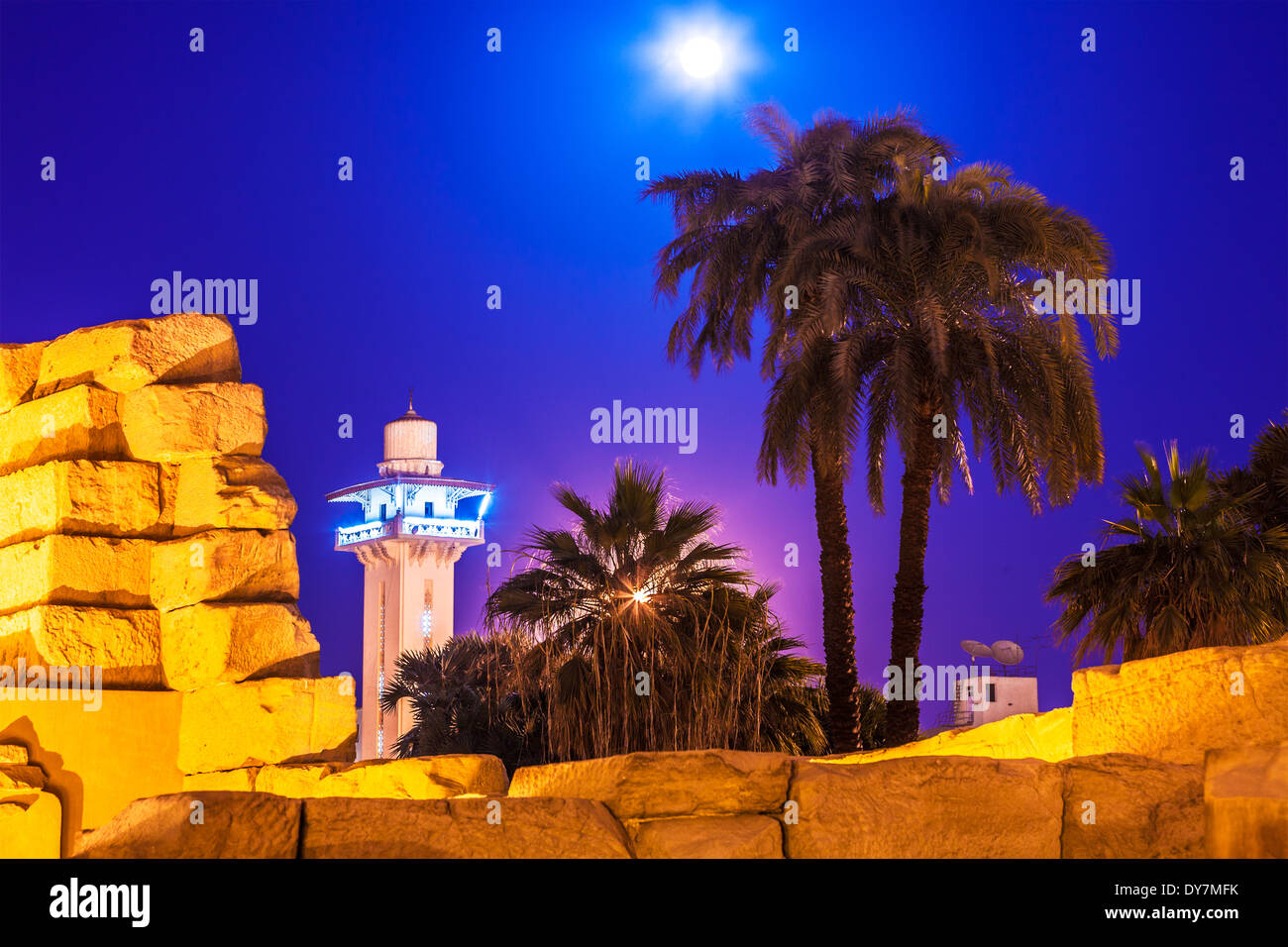 The ruins of Luxor Temple with a modern mosque in the background. Stock Photo