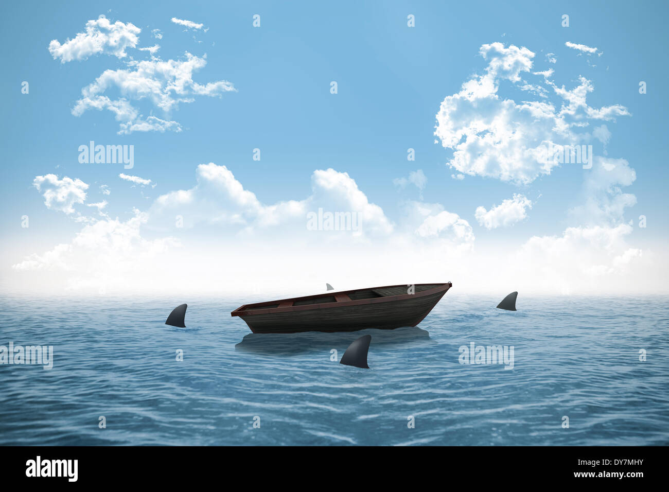 Sharks circling small boat in the ocean Stock Photo