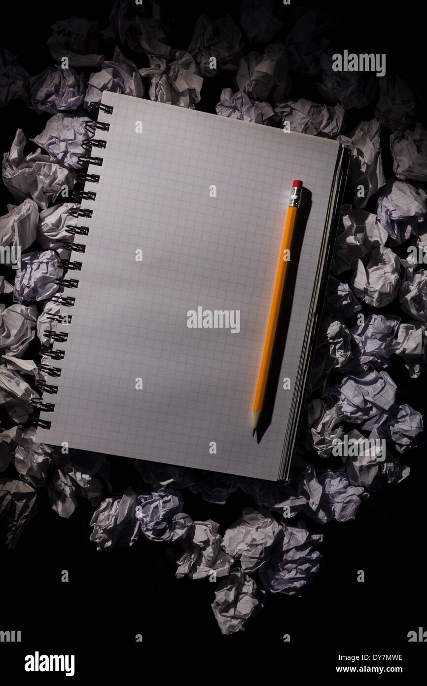 Graph paper notebook with pencil Stock Photo