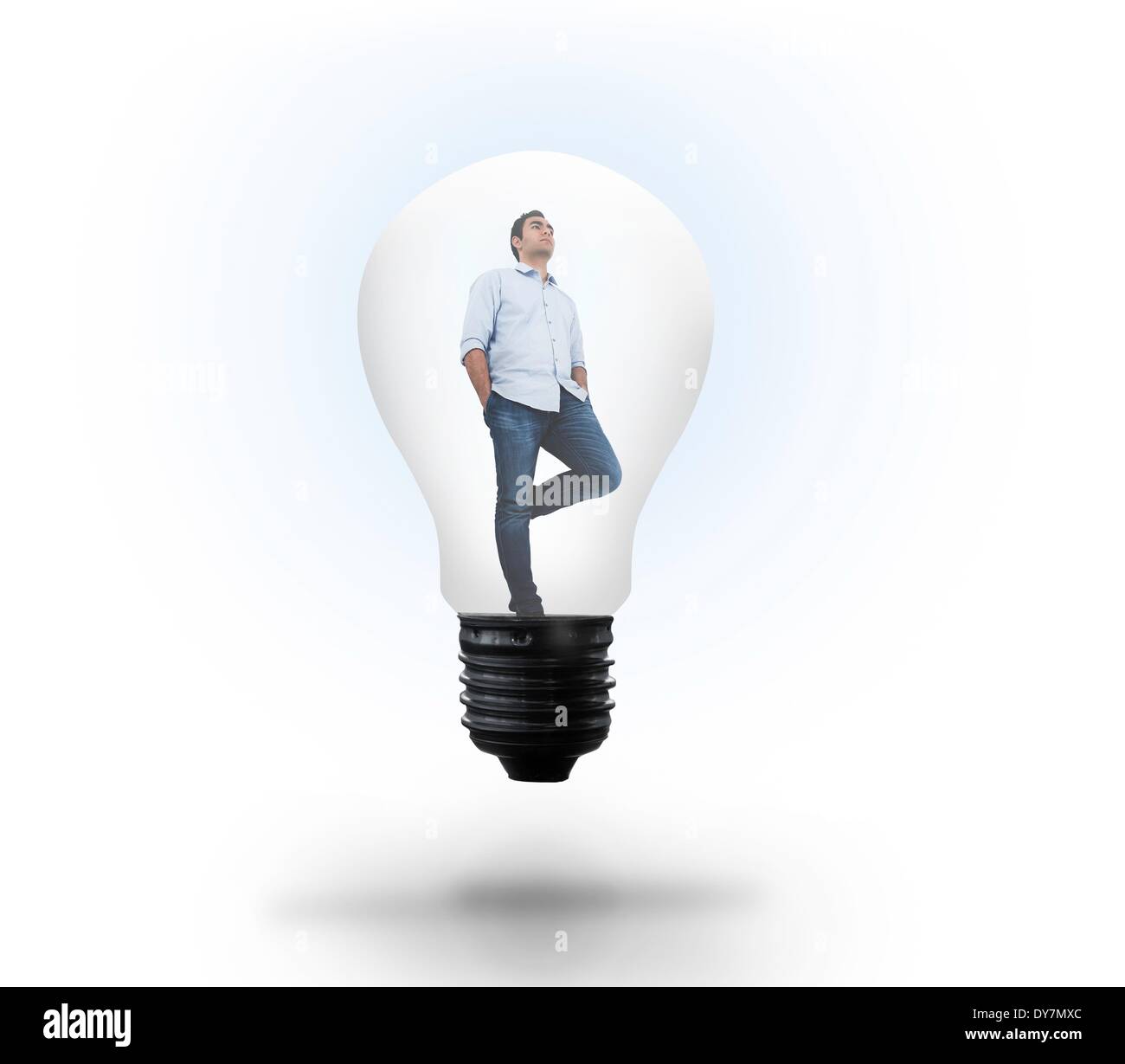 Thinking man in light bulb Stock Photo