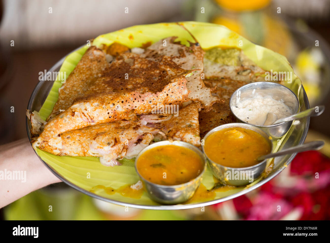 Onion rava dosa in a restaurant in Madurai, South India Stock Photo