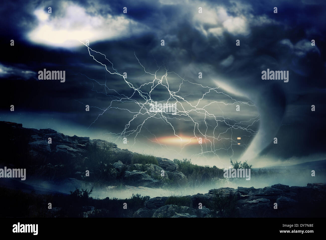 Digitally generated stormy sky with tornado over road Stock Photo - Alamy