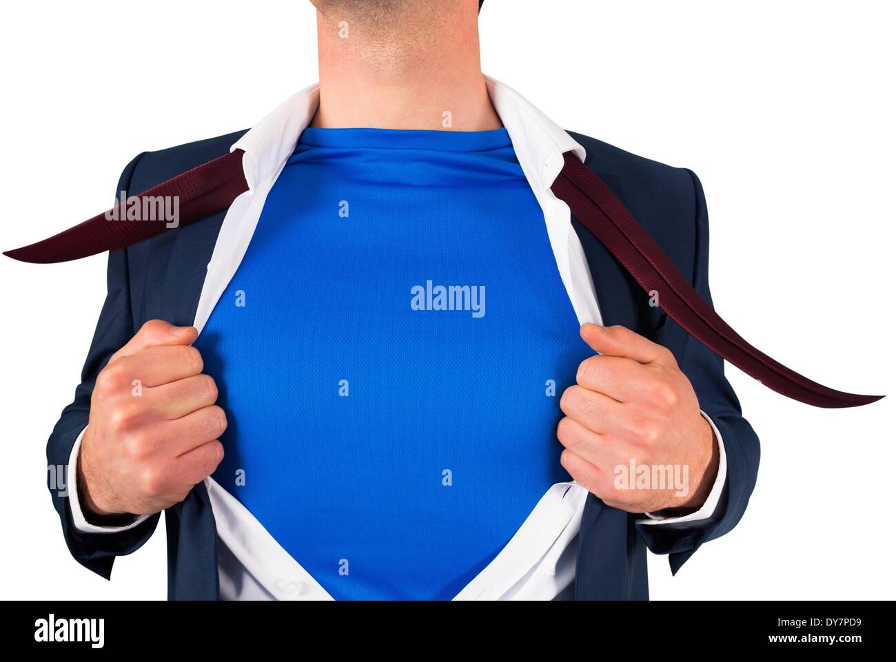 Businessman opening his shirt superhero style Stock Photo
