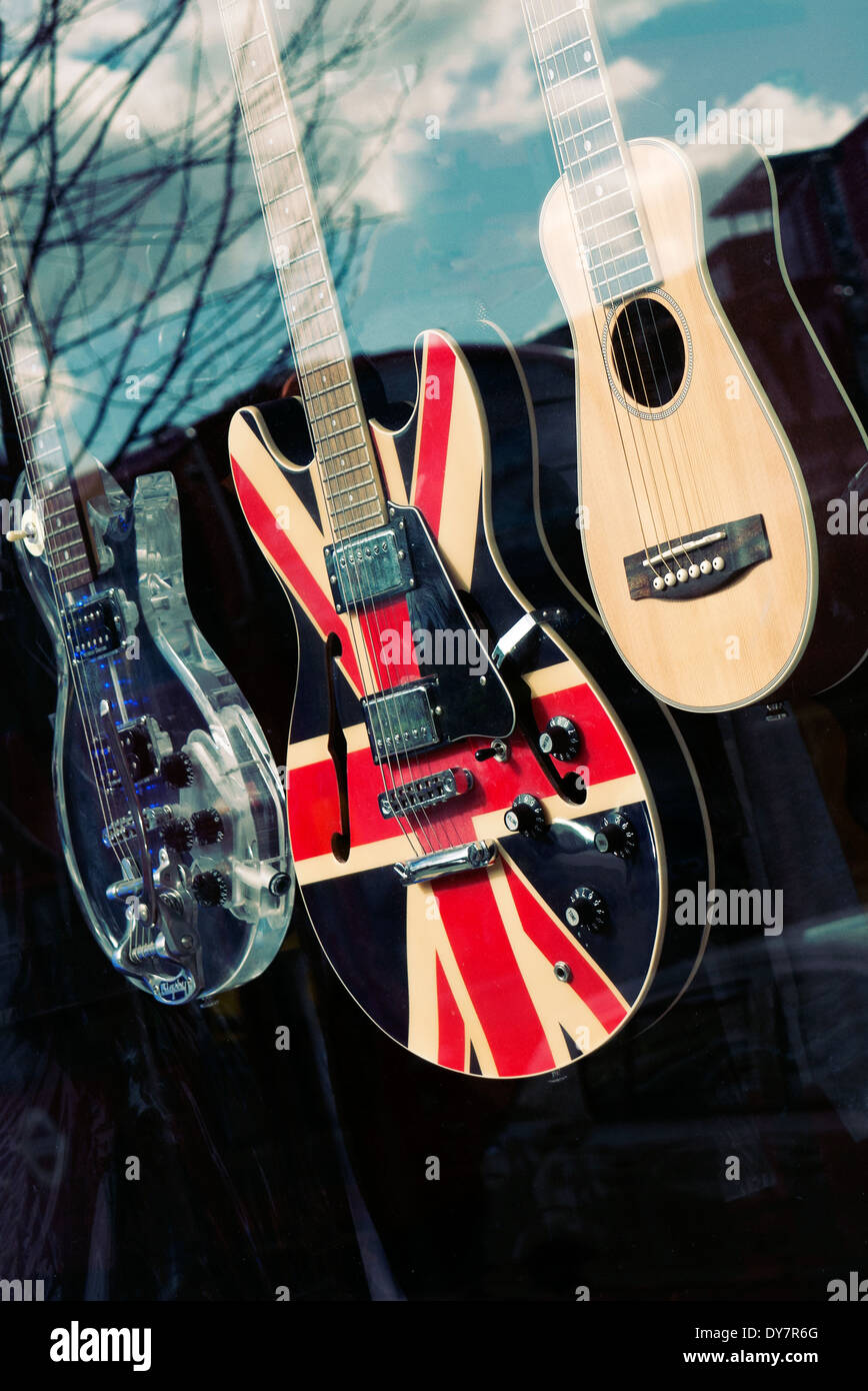 Union Jack Gibson guitar in the window of a guitar shop Stock Photo