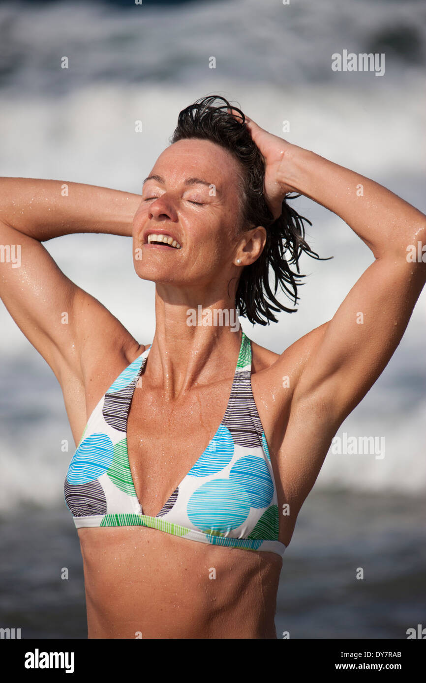 Mature woman in bikini hi-res stock photography and images - Alamy