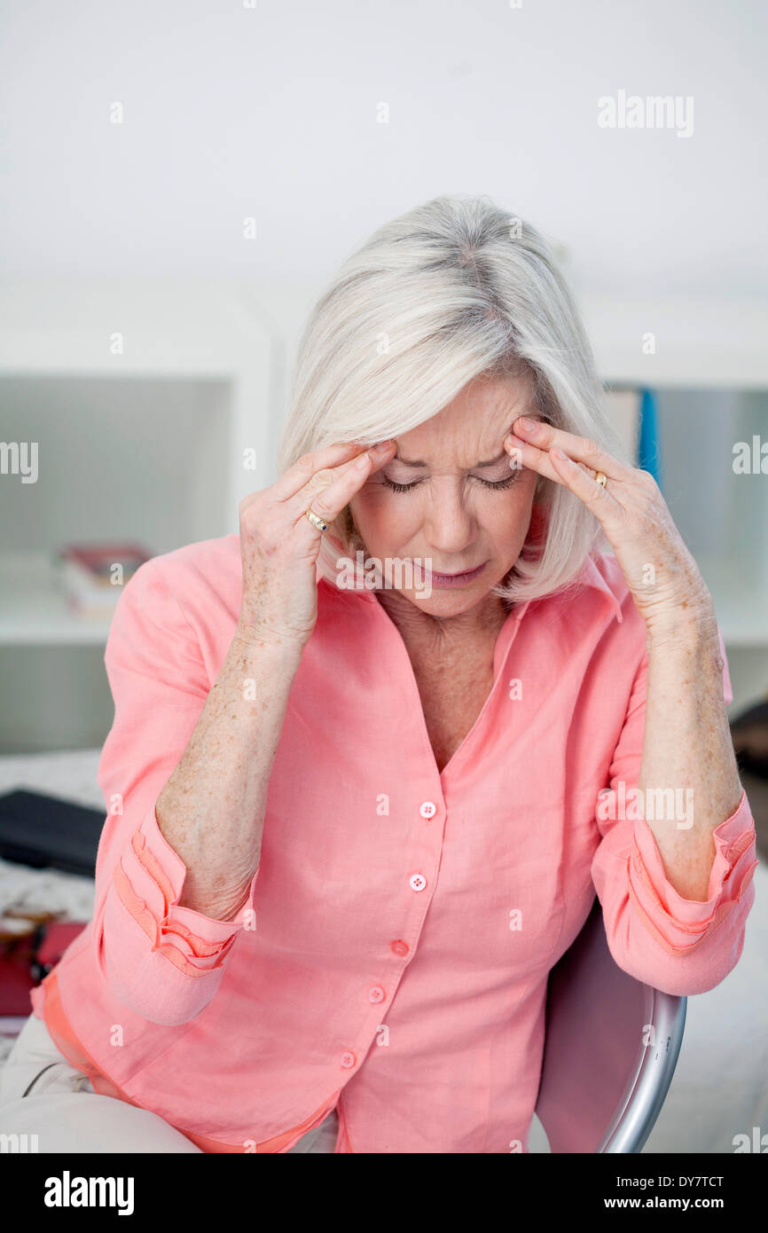 Elderly person with headache Stock Photo Alamy