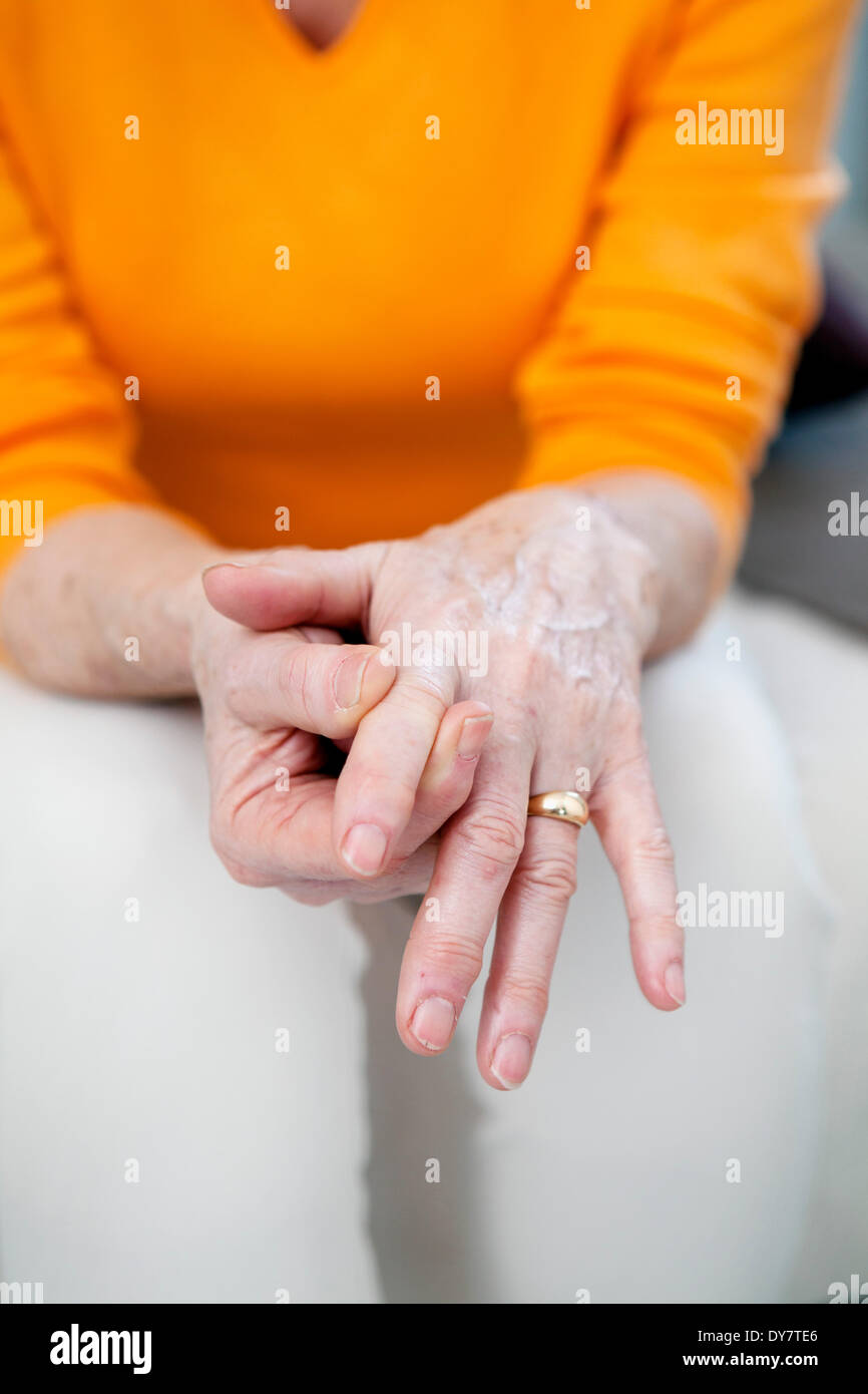 Elderly person with painful hand Stock Photo