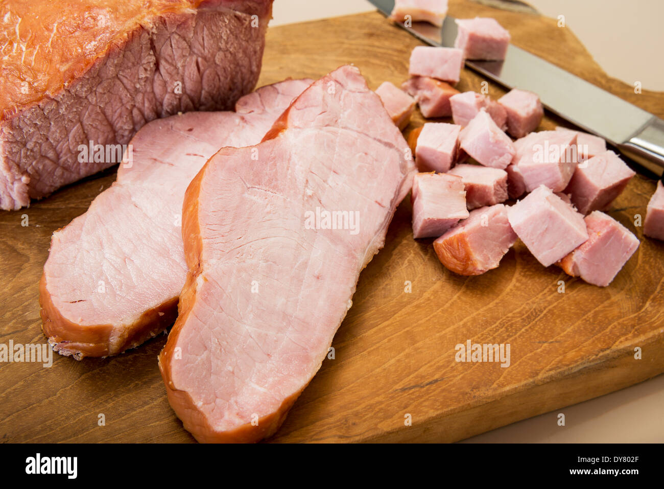 Cooked Kassler on chopping board Stock Photo