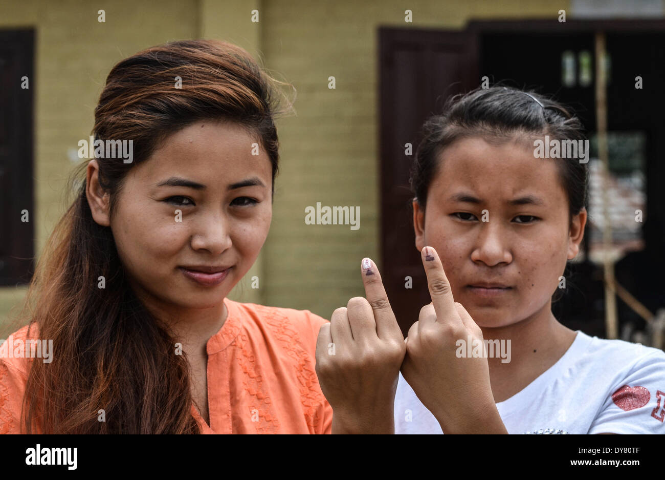 Dimapur, India. 9th Apr, 2014. Naga women shows thier ink-marked finger after casting thier vote during the second phase of Lok Sabha election in Dimapur, India north eastern state of Nagaland on Wednesday, April 09, 2014. India began voting on April 7 and ends on May 12 where hundreds of millions will have cast their ballots to form a new India Government. Credit:  Caisii Mao/NurPhoto/ZUMAPRESS.com/Alamy Live News Stock Photo