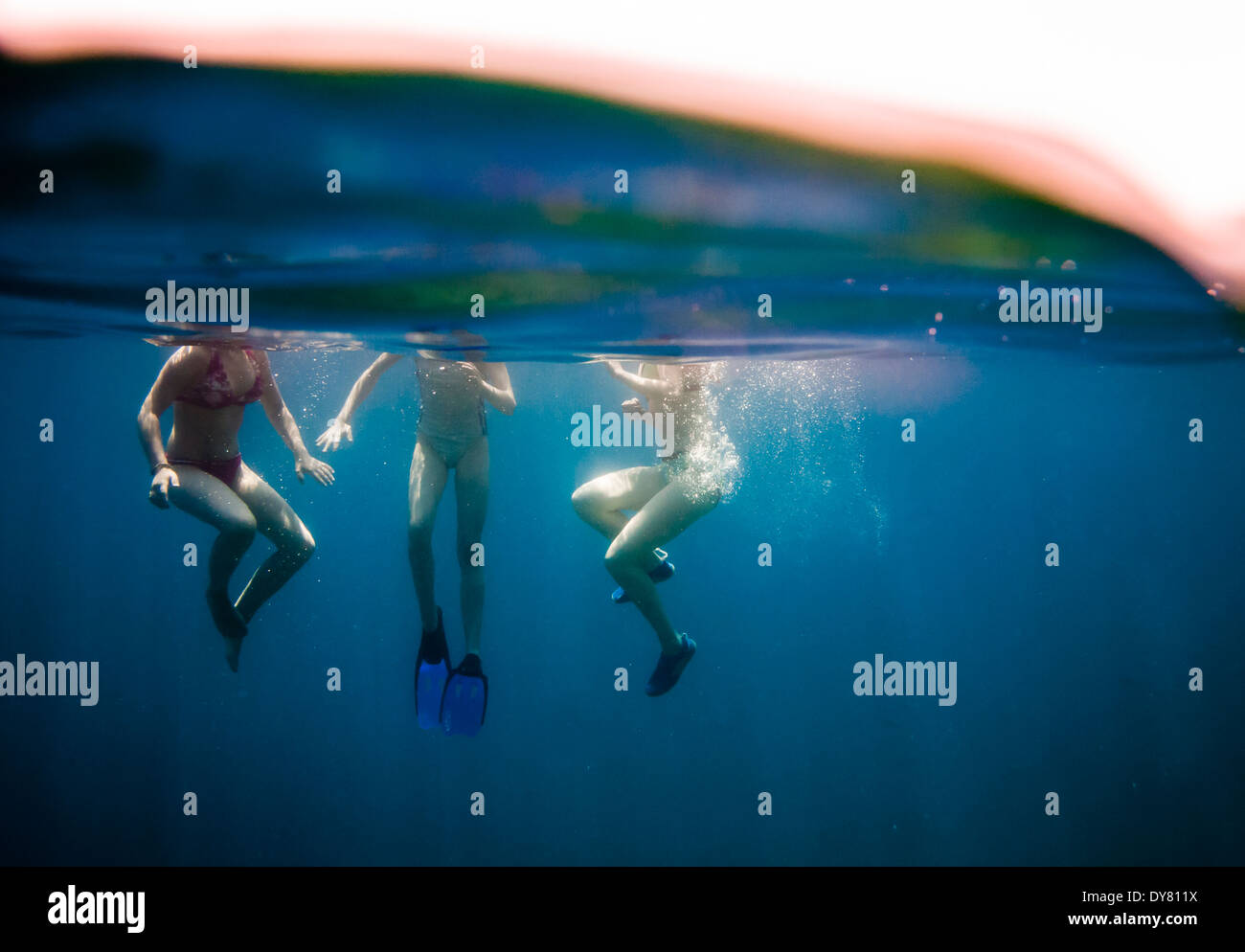 Croatia, Brac, Sumartin, Three girls under water Stock Photo