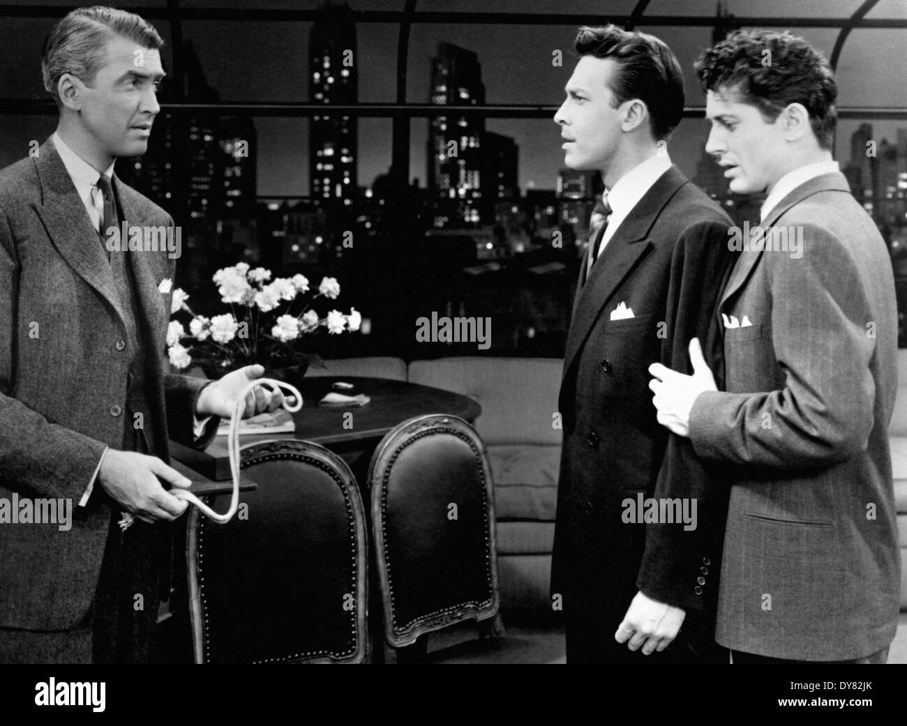 The Rope - James Stewart, John Dall, Farley Granger - Director : Alfred Hitchcock - 1948 Stock Photo