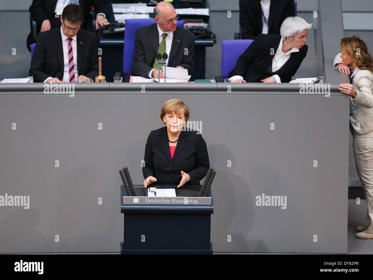 Berlin, Germany. 9th Apr, 2014. German Chancellor Angela Merkel (front) speaks during a debate on the 2014 federal budget at the Bundestag, the lower house of parliament, in Berlin, Germany, on April 9, 2014. Credit:  Zhang Fan/Xinhua/Alamy Live News Stock Photo
