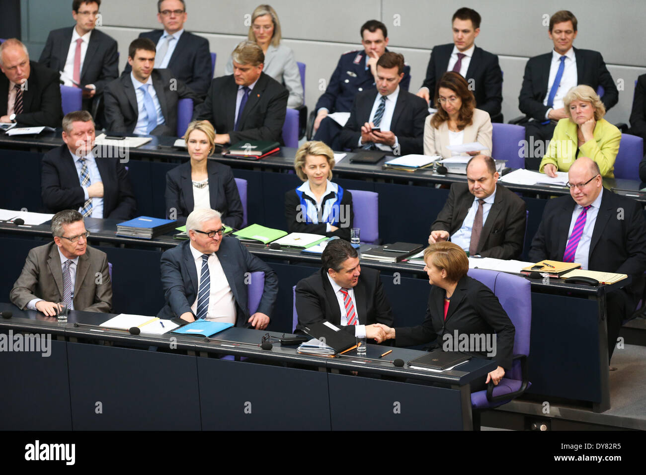 Berlin, Germany. 9th Apr, 2014. German Chancellor Angela Merkel (1st R Front) reacts after her speech during a debate on the 2014 federal budget at the Bundestag, the lower house of parliament, in Berlin, Germany, on April 9, 2014. Credit:  Zhang Fan/Xinhua/Alamy Live News Stock Photo