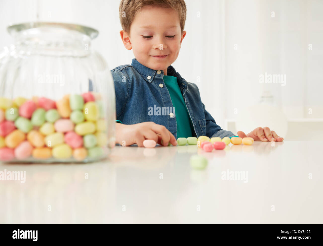 Child counting candy hires stock photography and images Alamy