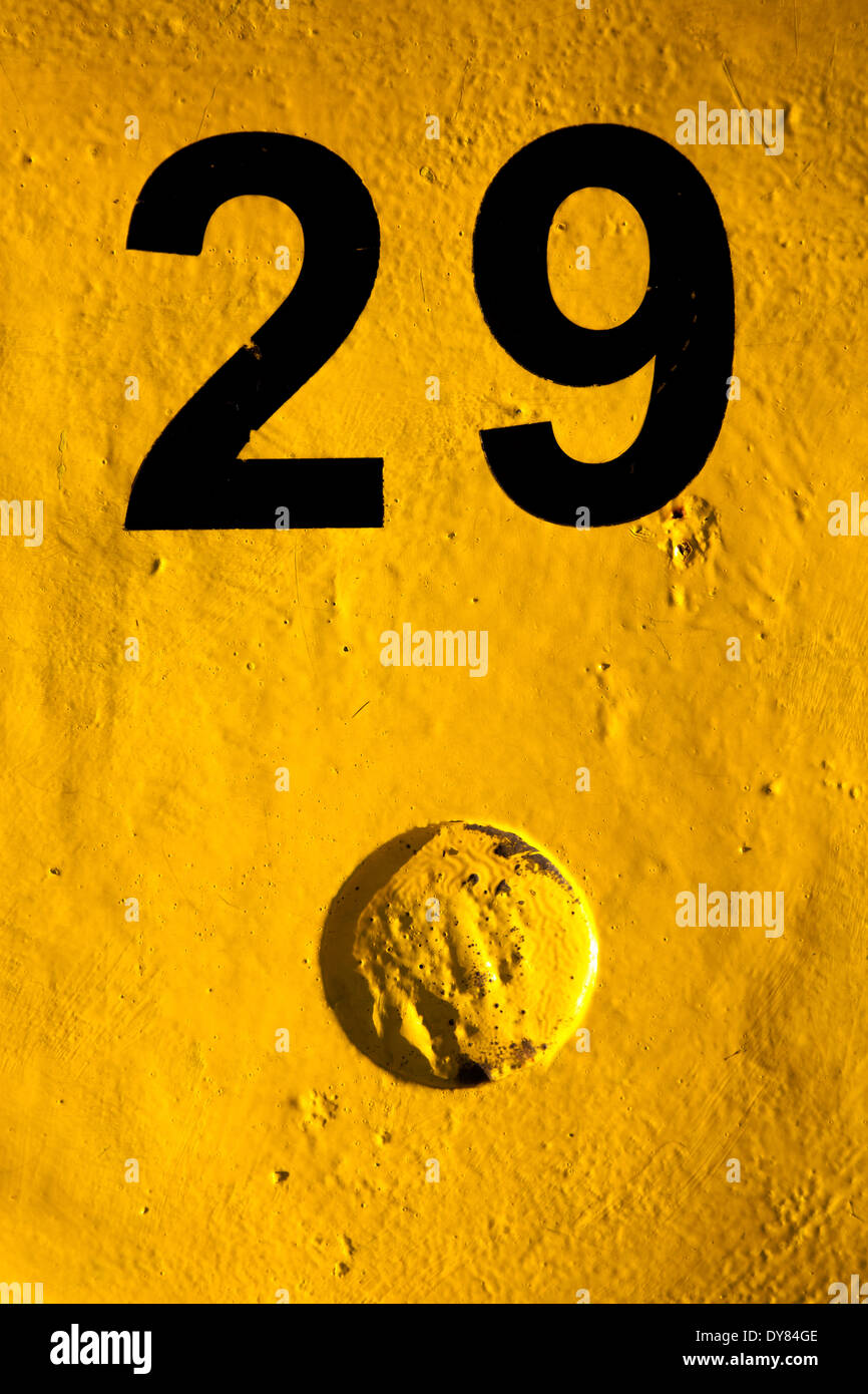 Number 29 on yellow background Stock Photo - Alamy