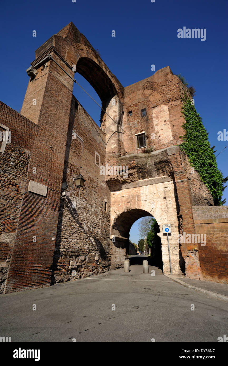 Italy, Rome, Celio, ancient fortifications of the Servian Walls, arch of Dolabella roman gate and Nero aqueduct ruins Stock Photo