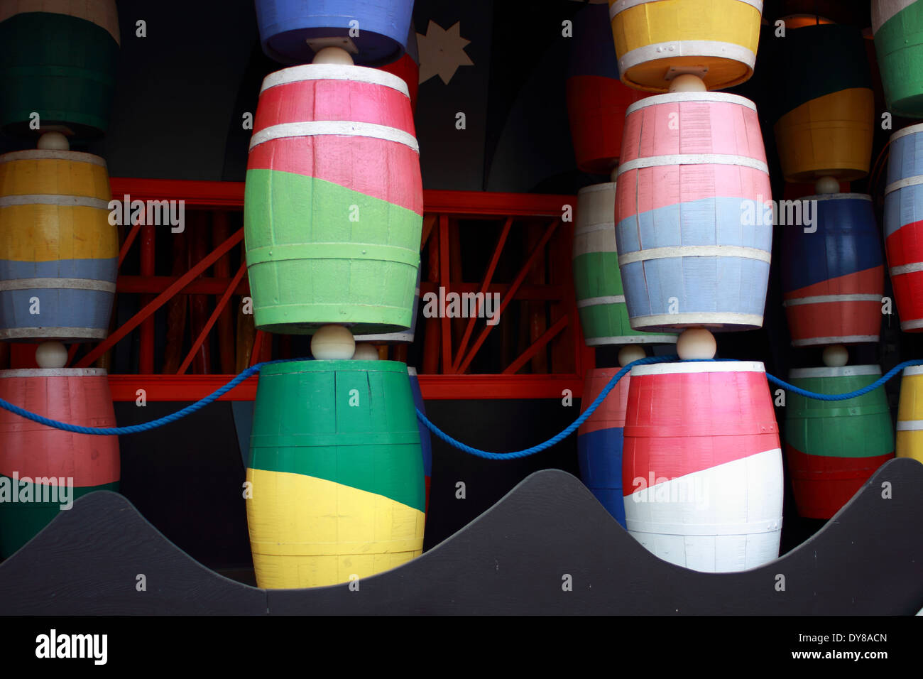 Colorful barrels at funhouse in fairground Stock Photo