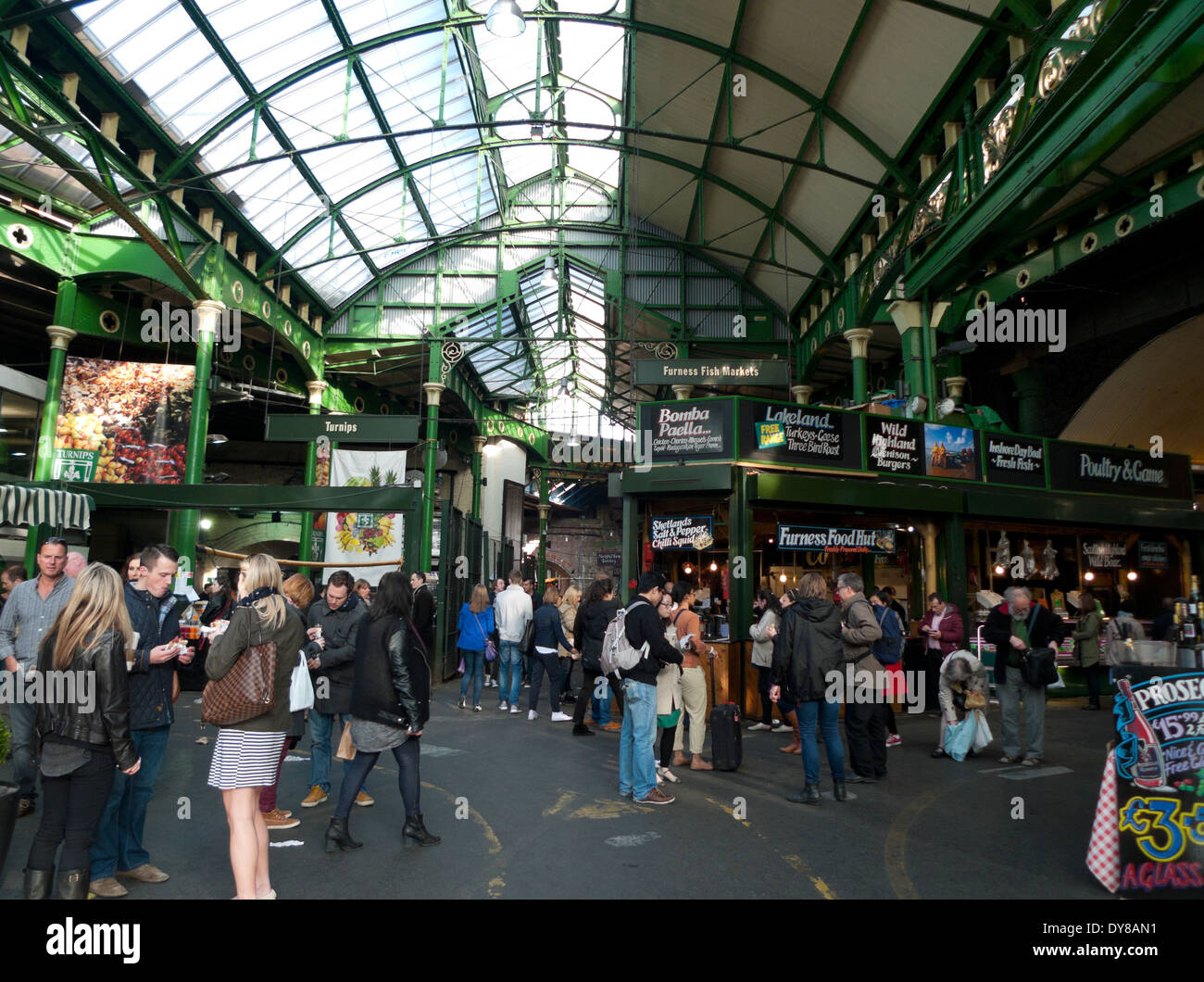 Interior view of people at food stalls in Borough Market, London Bridge, London, UK  KATHY DEWITT Stock Photo