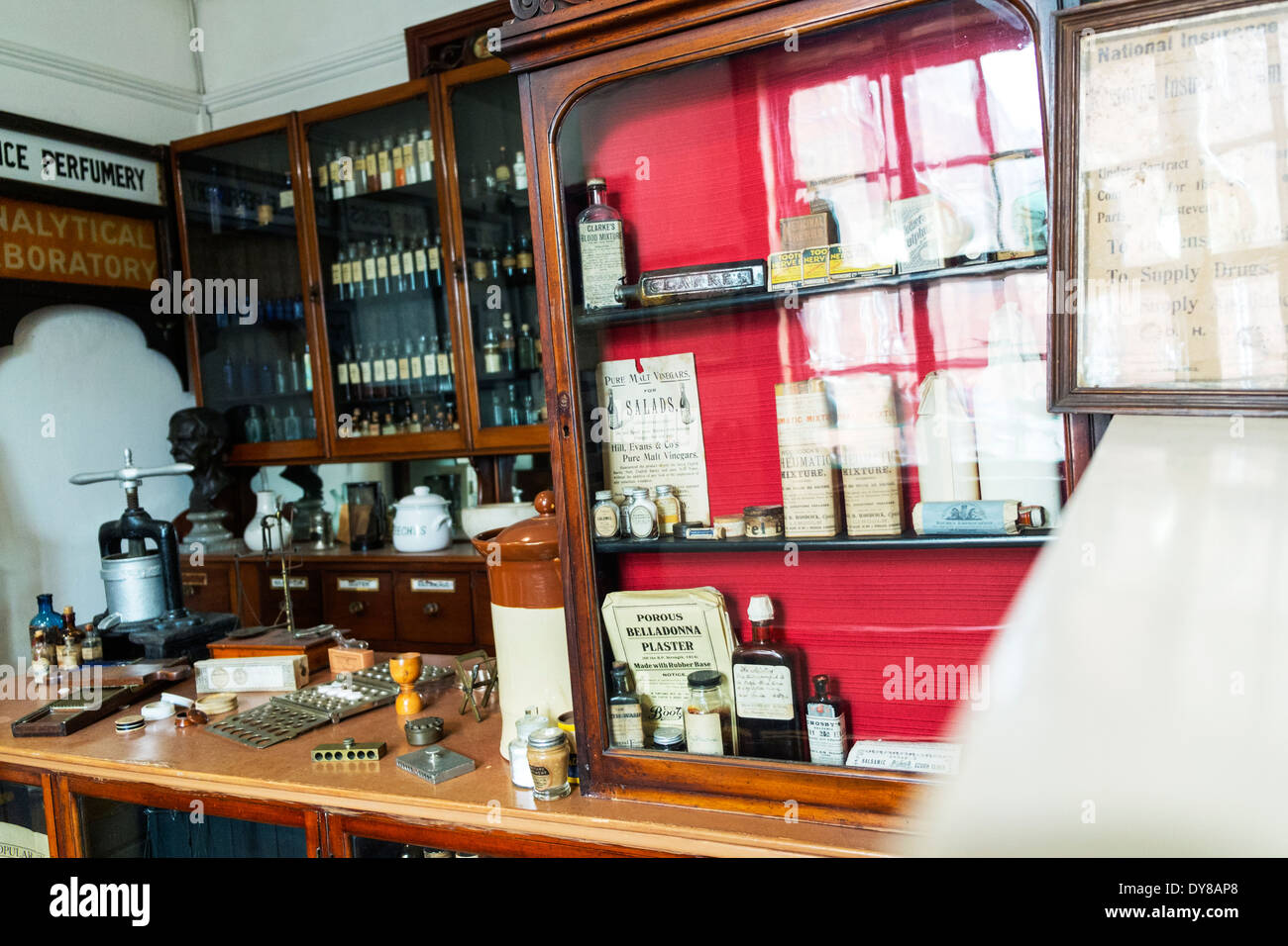 Victorian chemist shop lotions and potions on shelves health treatment Lincoln City Lincolnshire UK GB England Stock Photo