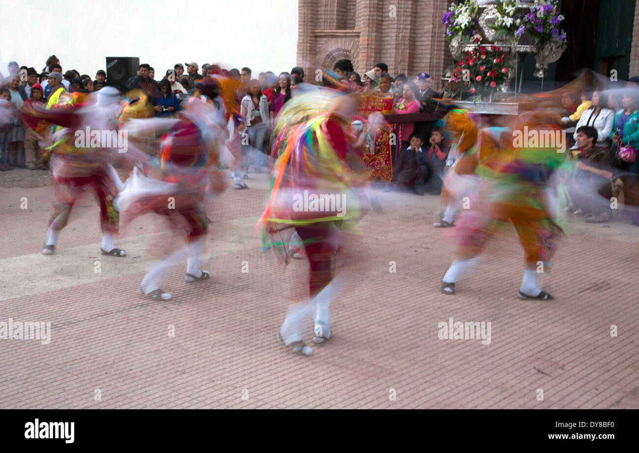 Peru, Calca, dancers in front of church with Virgin Mary statue during Assumption of the Virgin festival in August Stock Photo