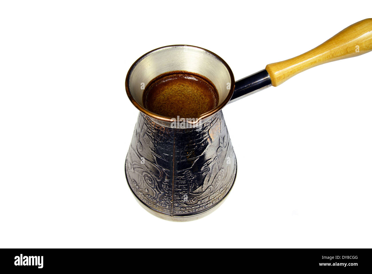 turkish coffee brewing pot isolated on white Stock Photo