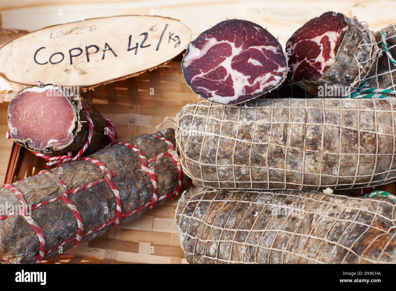 Rural hand-made sausage Coppa, gourmet meat product on Provence market Stock Photo
