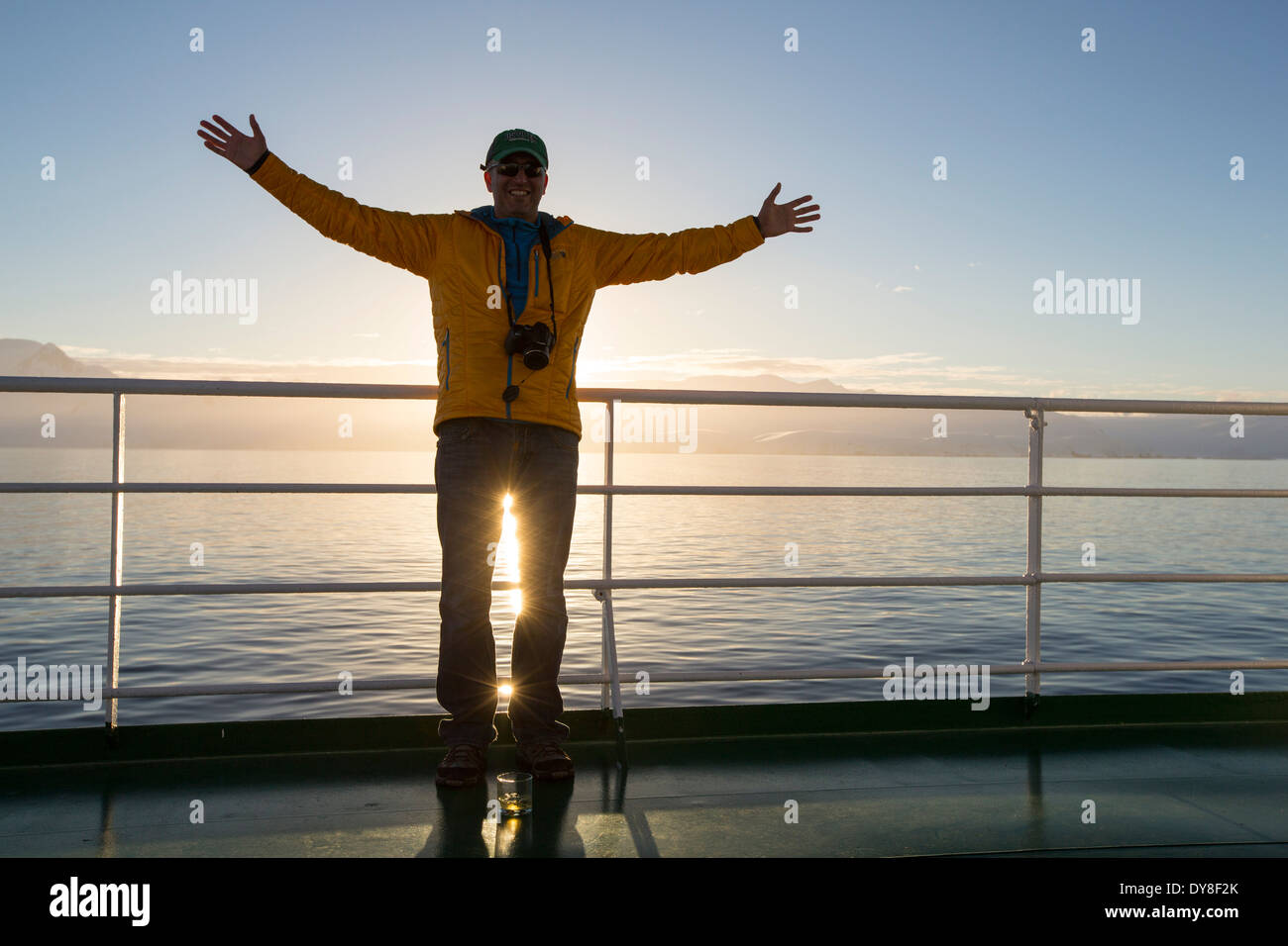 A passenger on the deck of the Akademik Sergey Vavilov, an ice strengthened ship on an expedition cruise to Antarctica Stock Photo