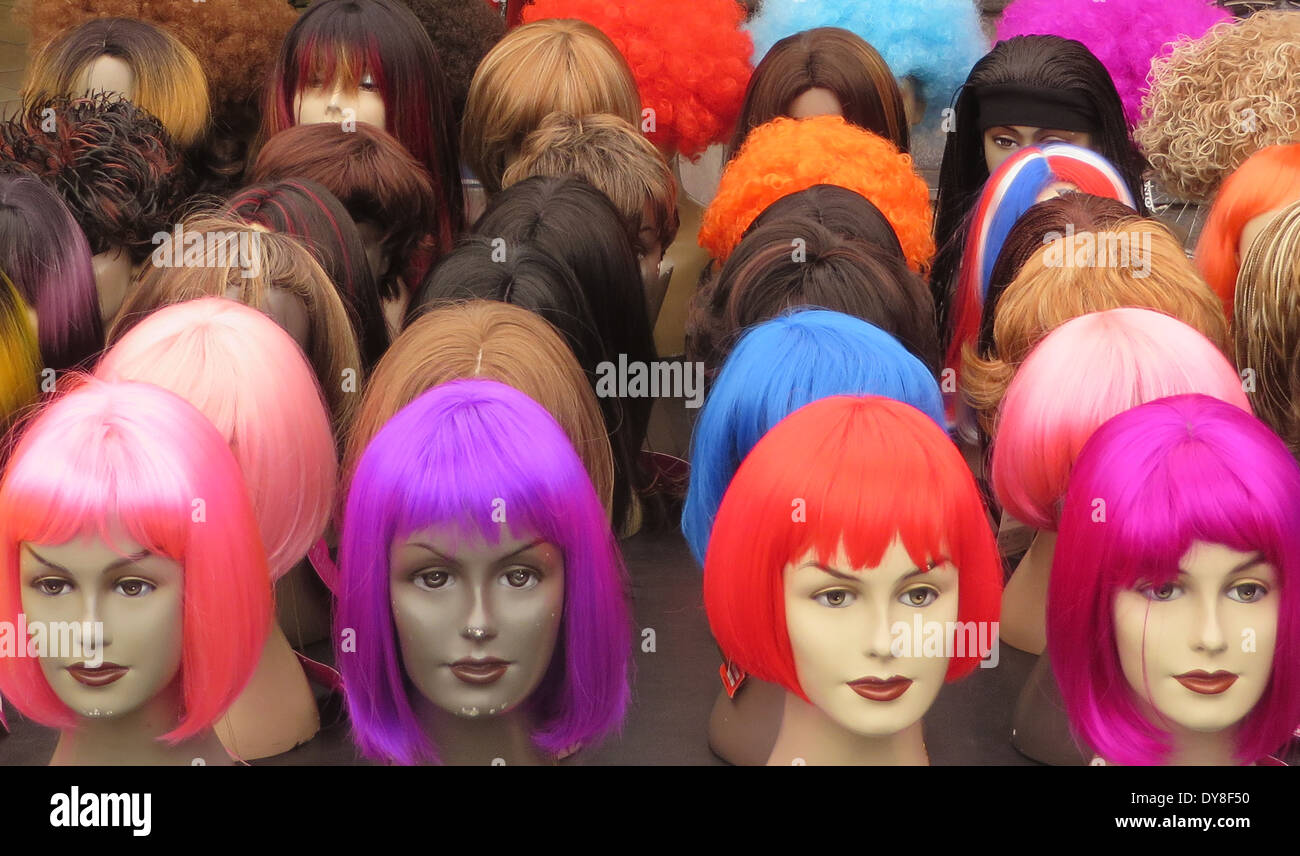 The colors wigs at Albert Cuyp Market on 26 March, 2014 in Amsterdam, Netherlands - Photo by Paulo Amorim Stock Photo