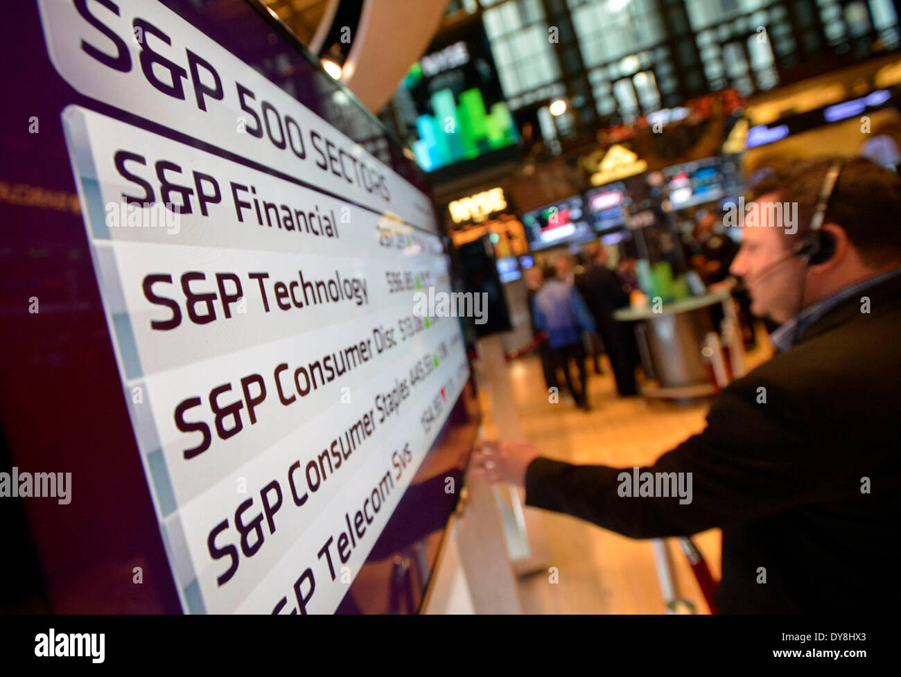 (140409) -- NEW YORK, April 9, 2014 (Xinhua) -- A trader works beside an electric board showing the S&P 500 index at the New York Stock Exchange in New York, April 9, 2014. U.S. stocks continued to rebound Wednesday, with major stock indices jumping over 1 percent, as market concerns over interest rate hike were eased somewhat by the minutes of the Federal Reserve's latest policy meeting. The Dow Jones Industrial Average surged 181.04 points, or 1.11 percent, to 16,437.18. The S&P 500 soared 20.22 points, or 1.09 percent, to 1,872.18. The Nasdaq Composite Index climbed 70.91 points, or 1.72 pe Stock Photo