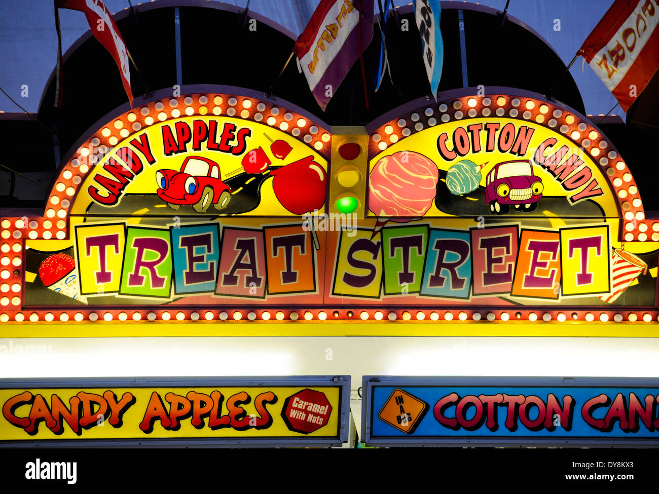 A lighted sign for 'Treat Street' a carnival / fair / festival candy and treats vendor Stock Photo